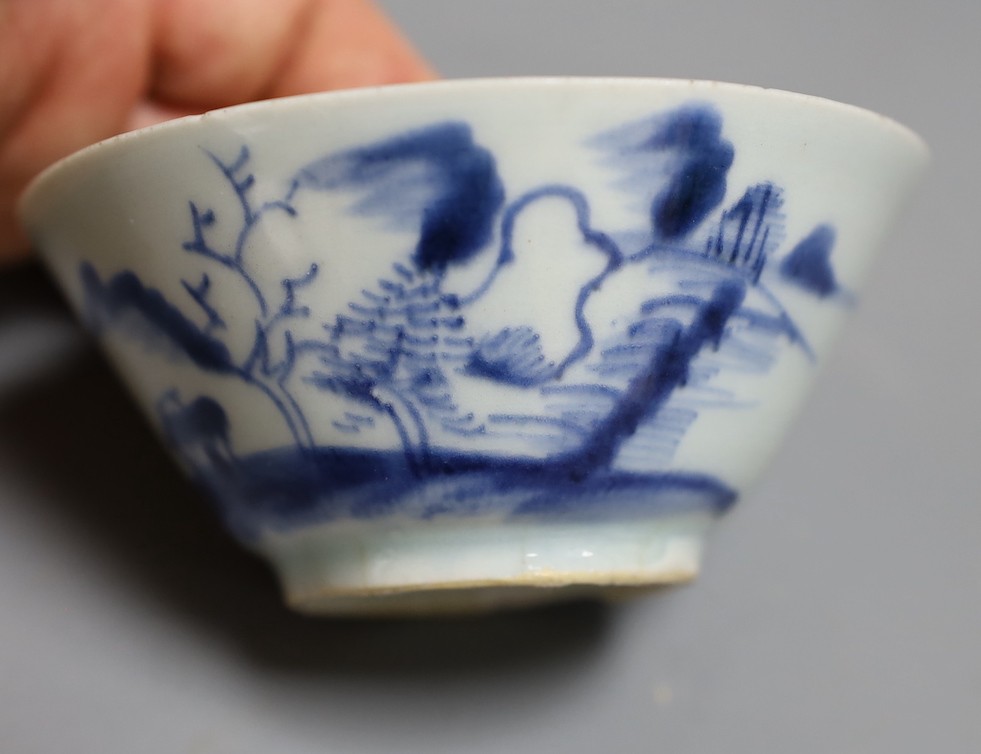 A Chinese clobbered dish with bronze mount, a Chinese blue-and-white Buddhist lion dish and a blue and white landscape bowl, 18th century and later